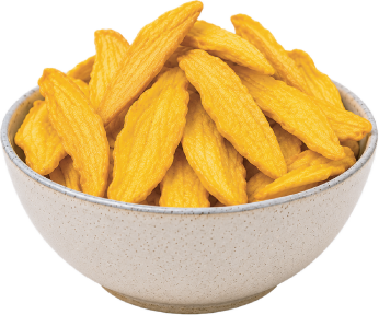 Bowl of golden vacuum-fried mango crisps