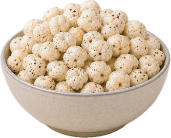 Bowl of salt and pepper popped water lily seeds